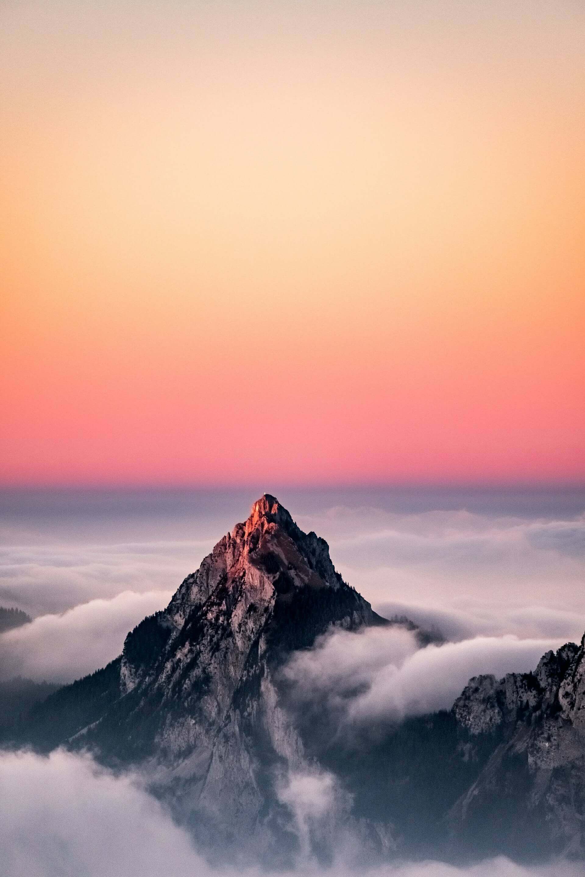 Mountain landscape with dramatic snow-capped peaks